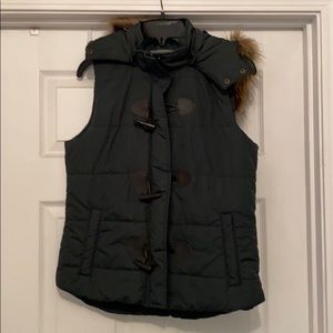 Dark teal vest with detachable hood.